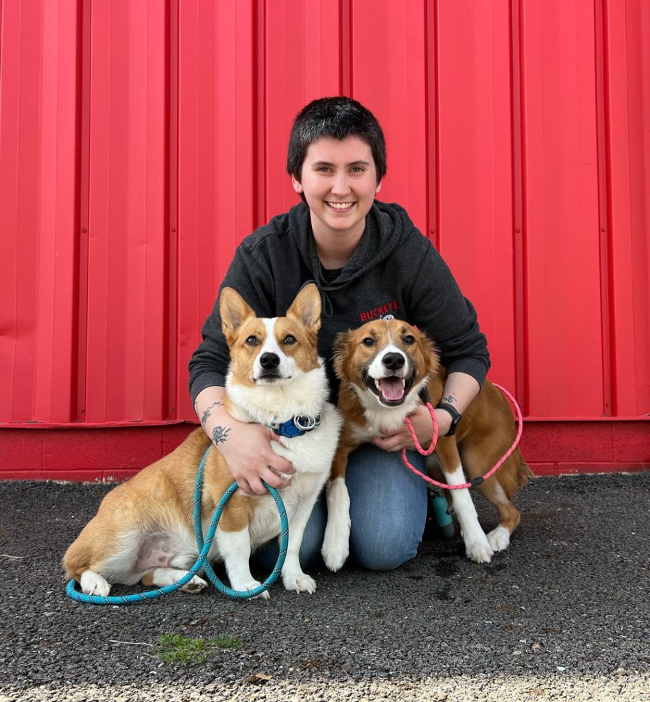 Buckeye K9 Trainer Lizzy Stout with her dogs on the buckeye k9 website.